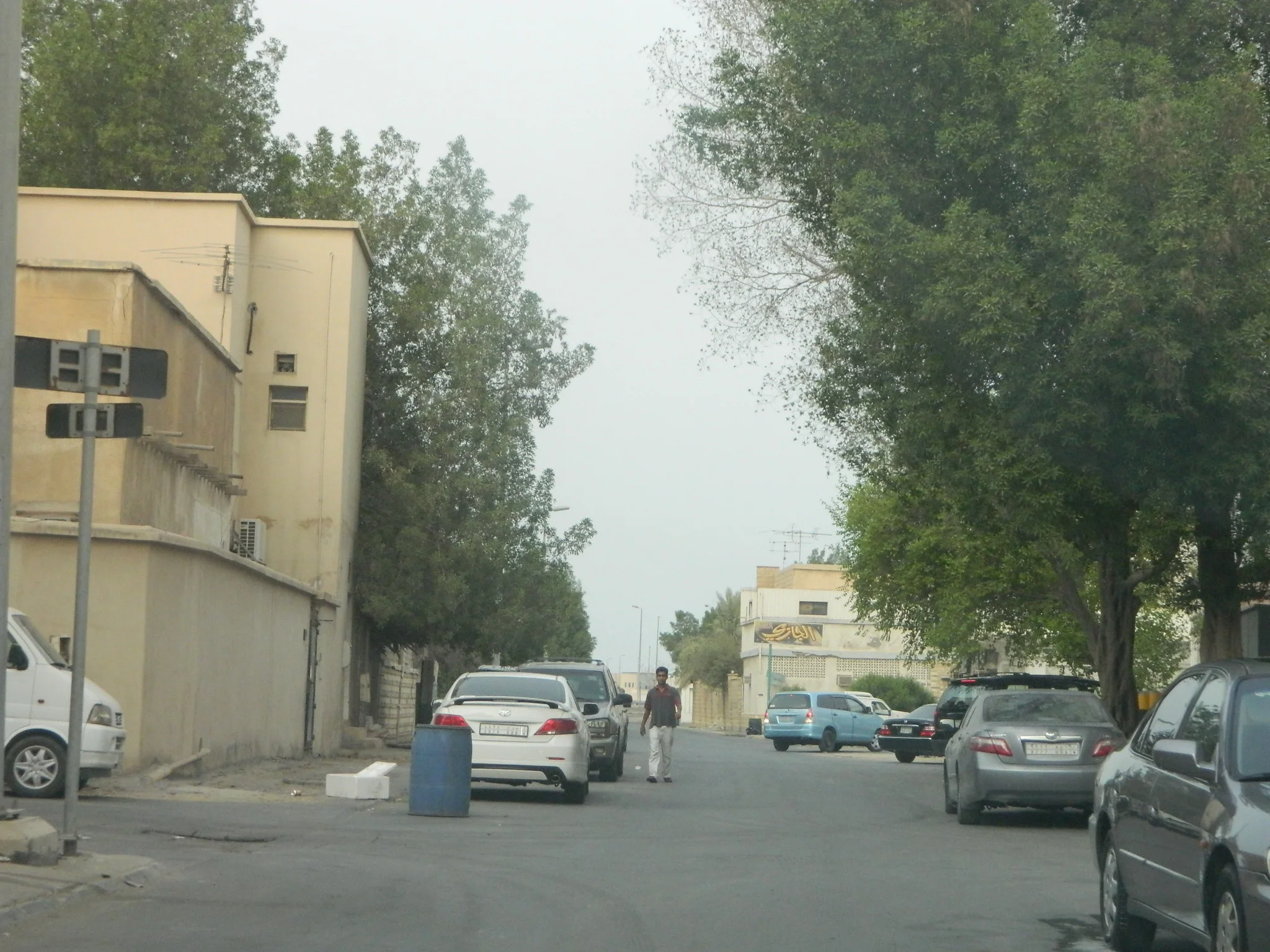 a snap of some inside street in one of the Saudi neighborhoods. Look at the cars, aren't they just average?