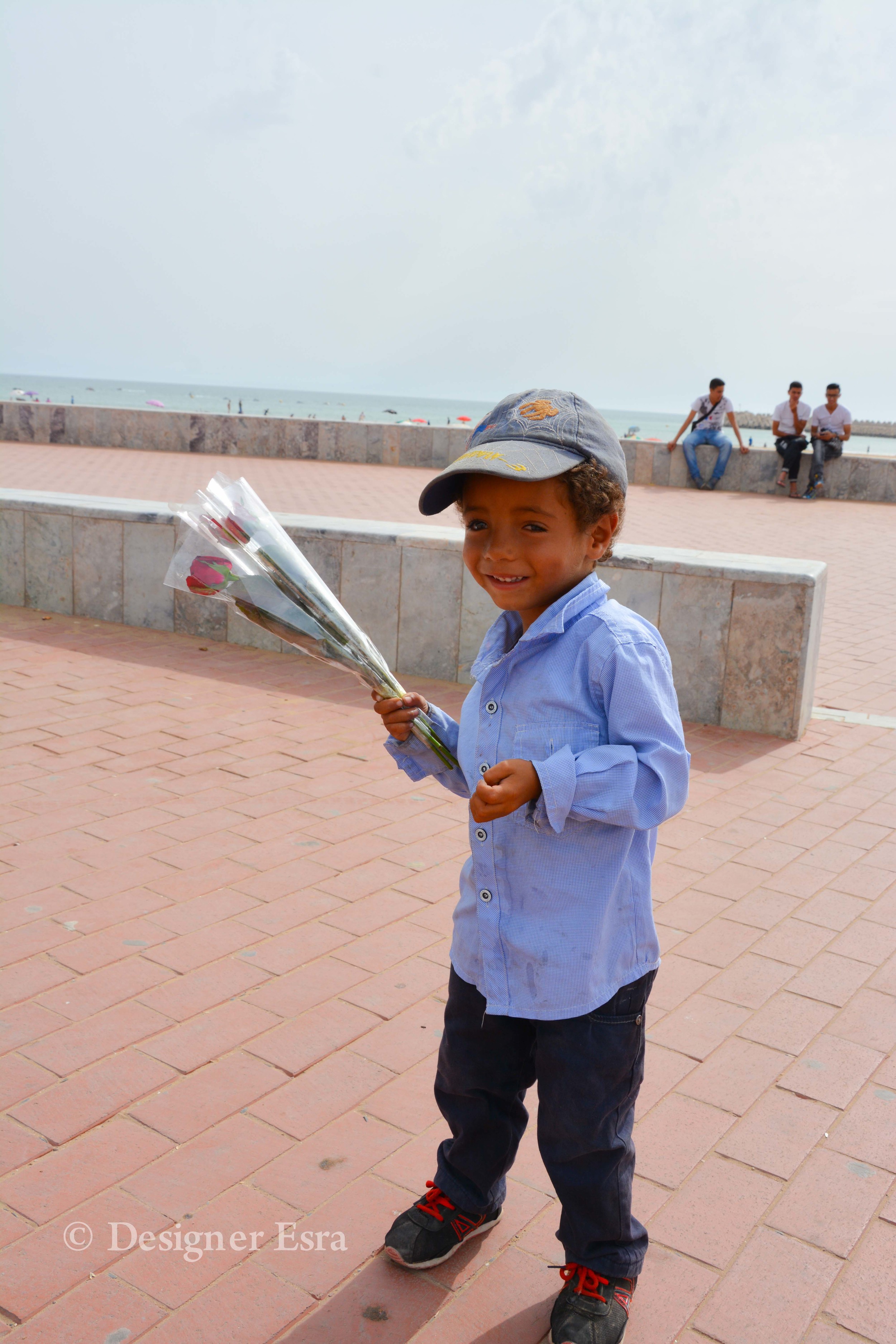 The cutest & youngest flower seller in Agadir, Morocco