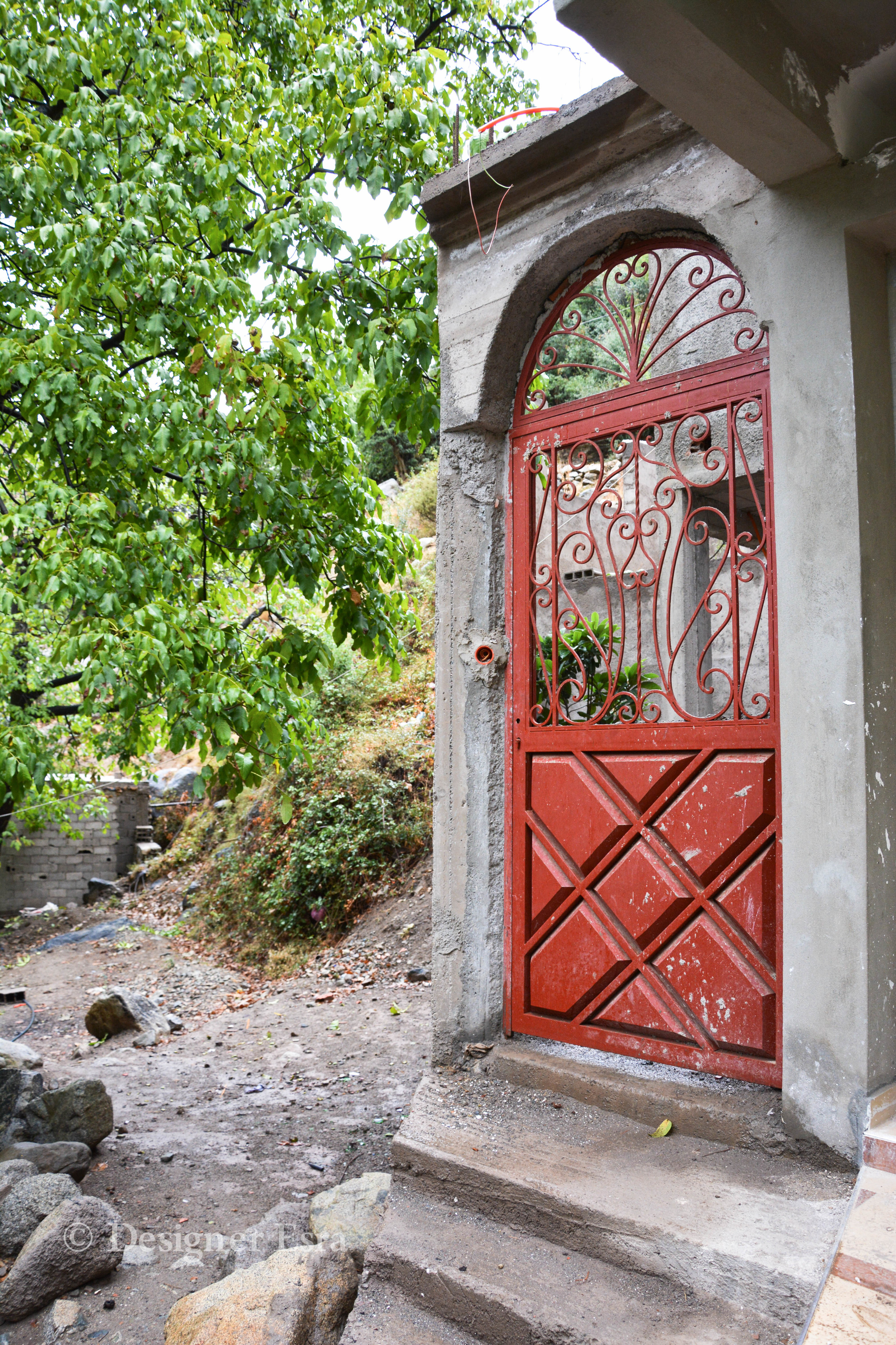 Bright Red Door in the mountains