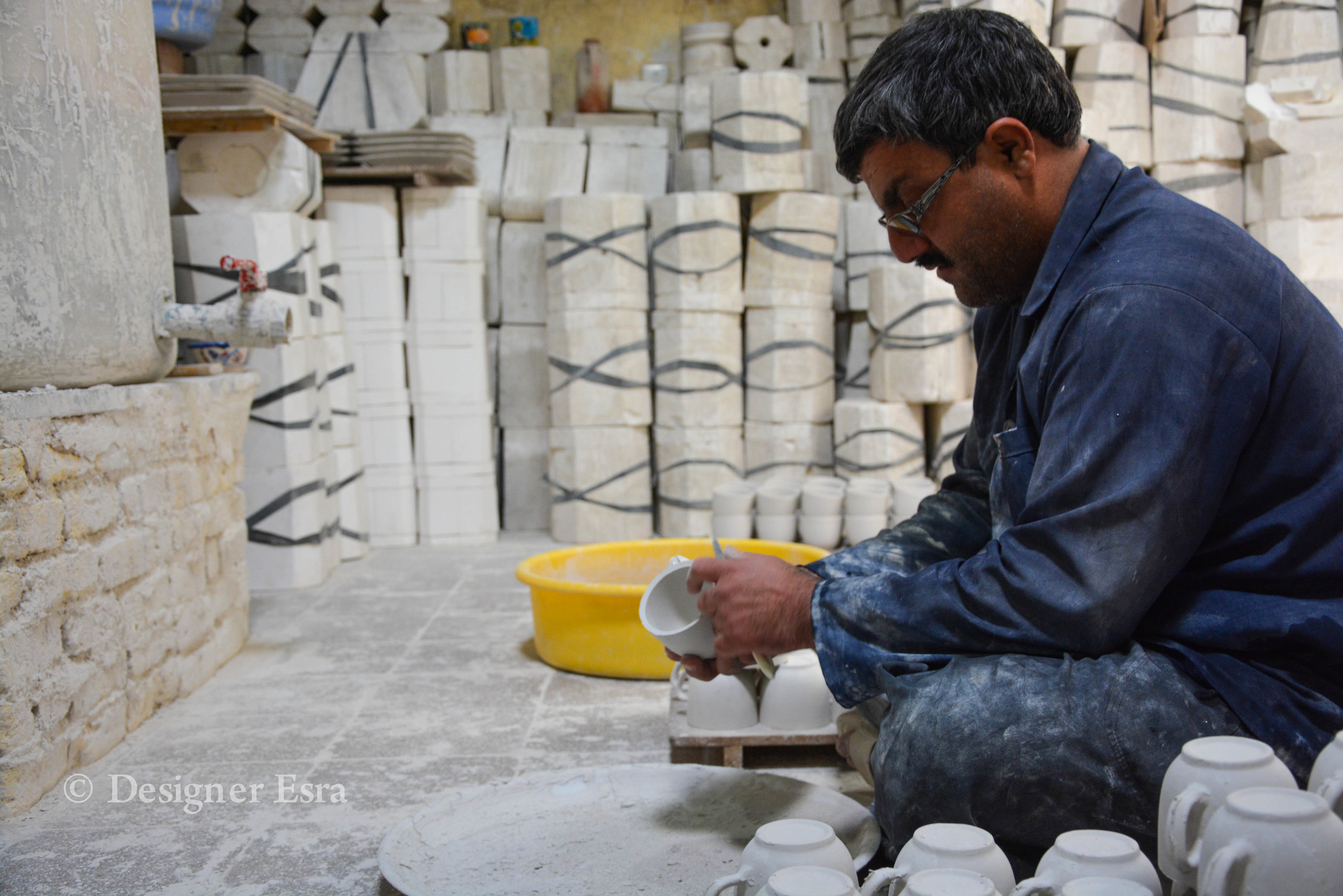 Sanding pottery in Iran 