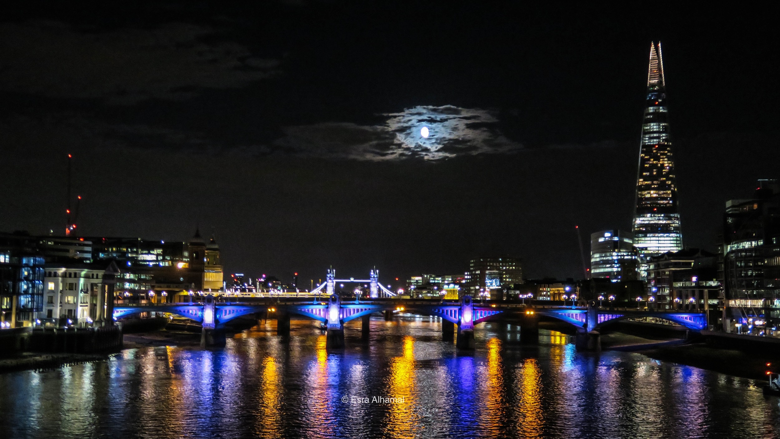Full moon and the Shard in London
