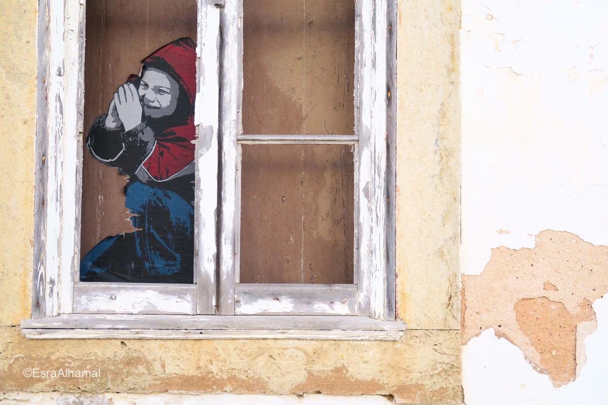 Graffiti in windows Lagos, Portugal