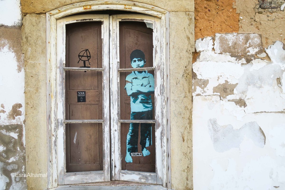 Graffiti in windows Lagos, Portugal