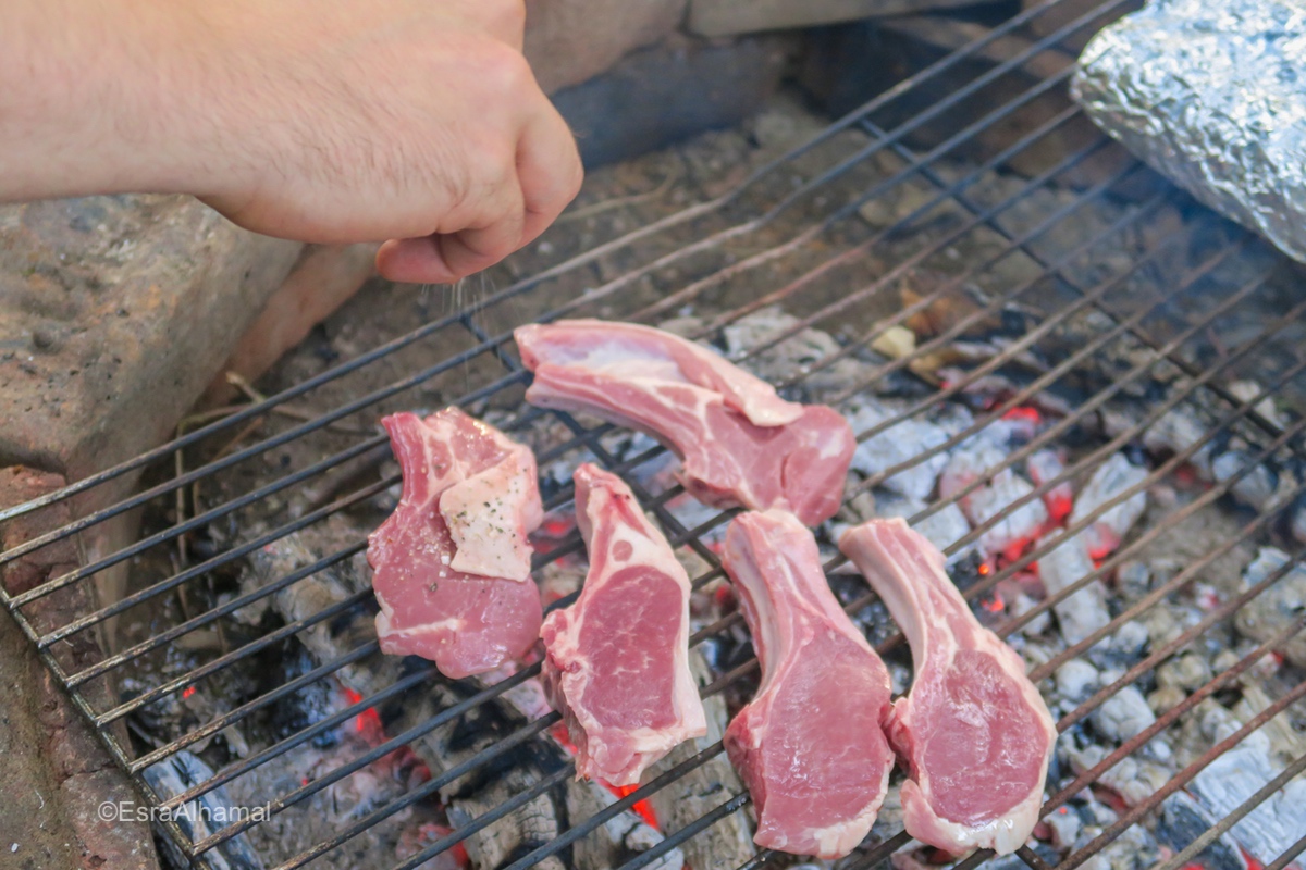 grilling meat in camping