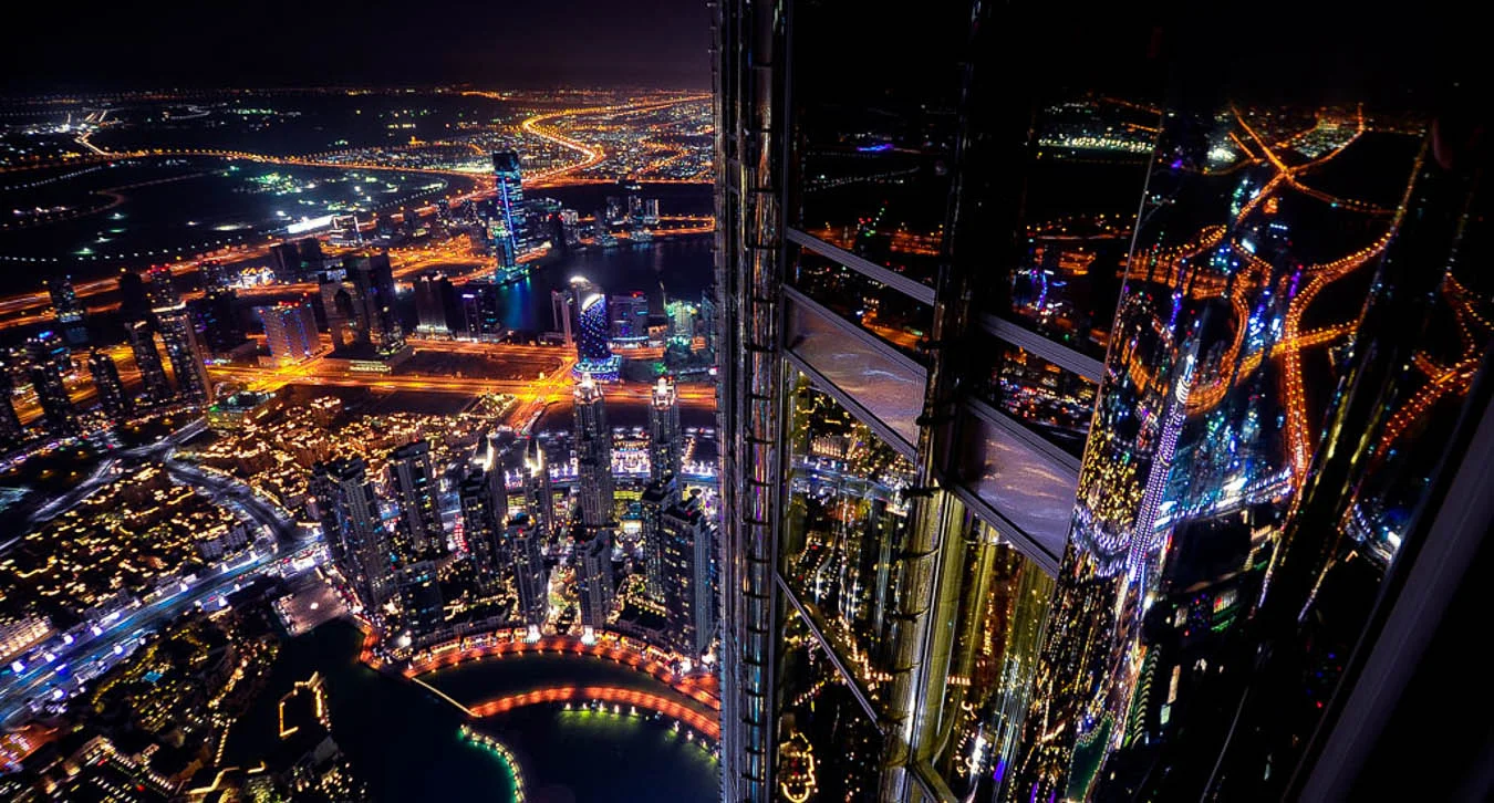 Dubai at night as seen from Burj Khalifa - A World to Travel.jpg