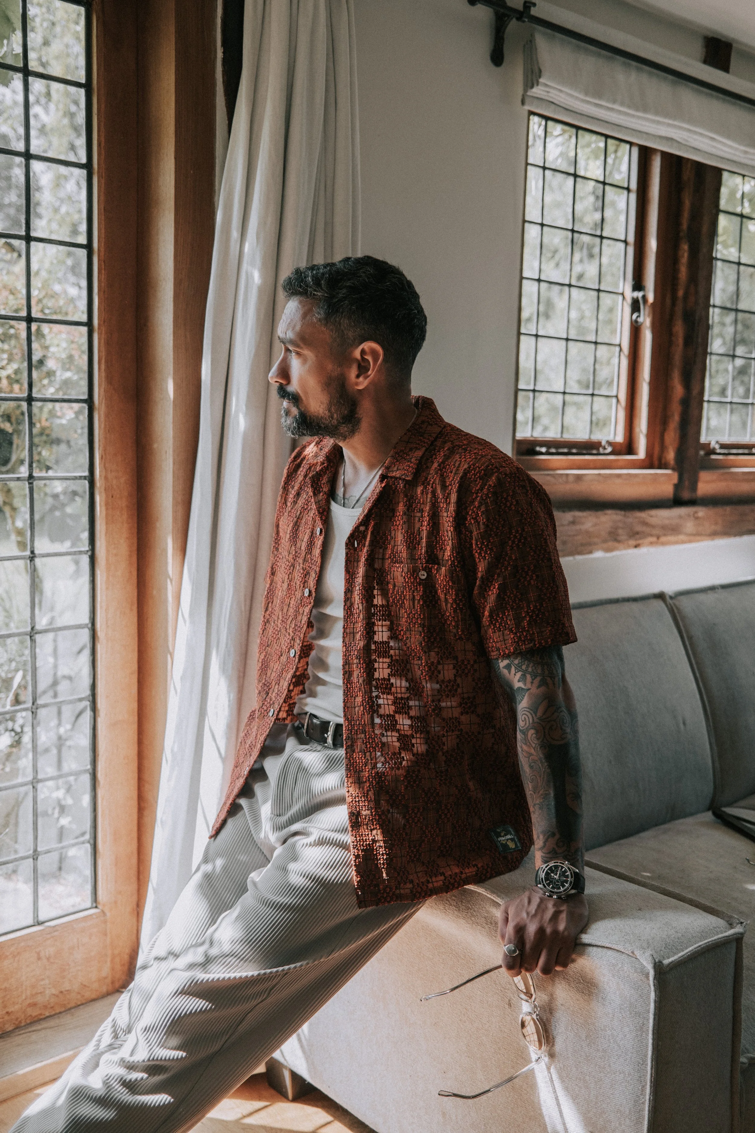 Embrace Elegance and Comfort with the Crochet Shirts Trend of 2023