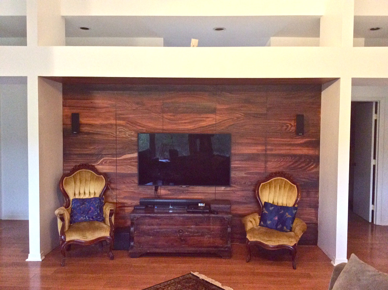 Texas Hill Country Residence. 7'x14'. Inspired by the beauty of woodgrain Kara uses the tromple-l'oeil method to mimic an american black walnut wall.