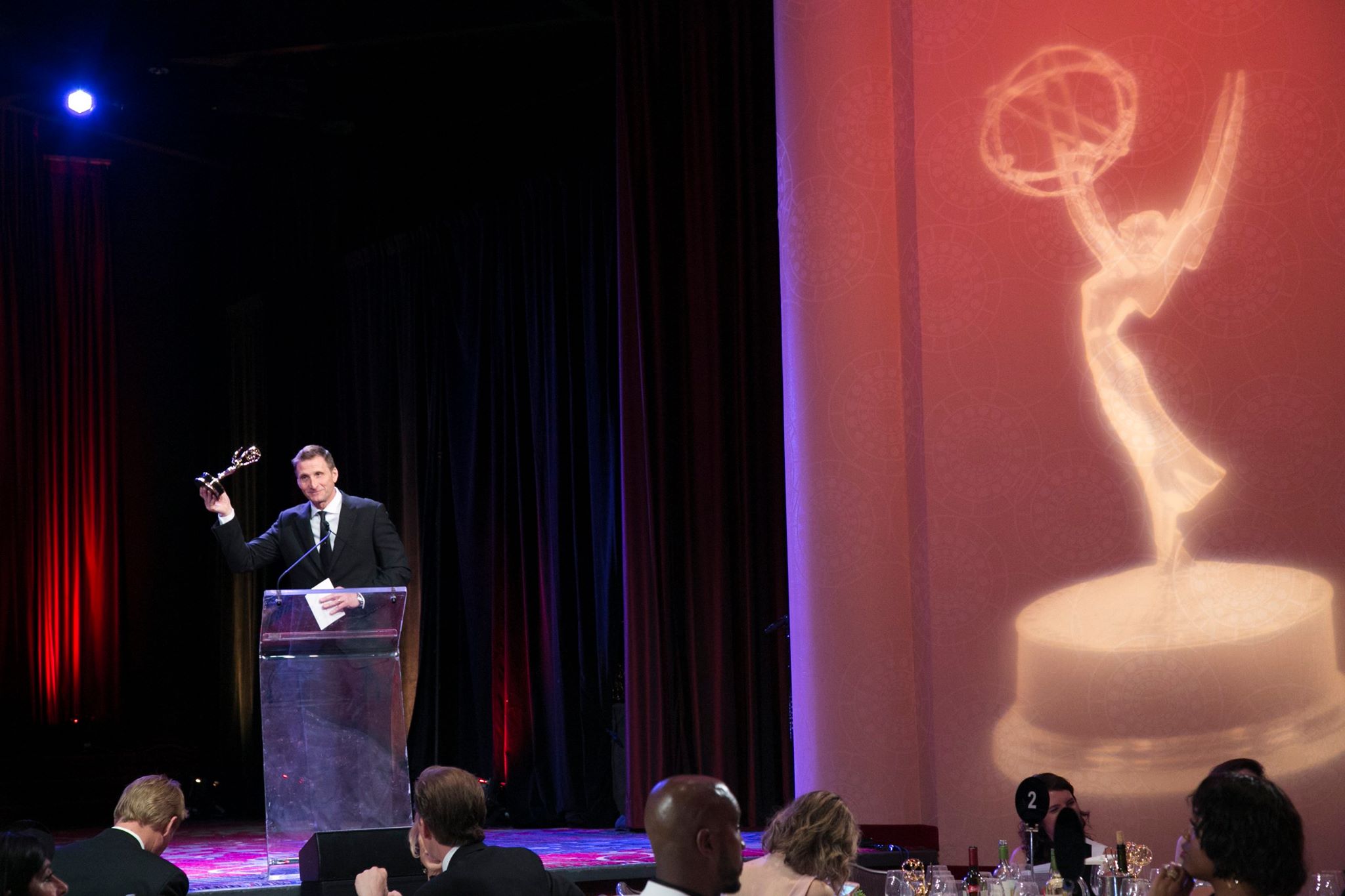  Founder and Executive Producer Roman Gackowski accepting an Emmy.&nbsp; 