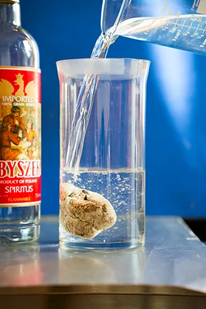 Alcohol is poured over the ambergris.