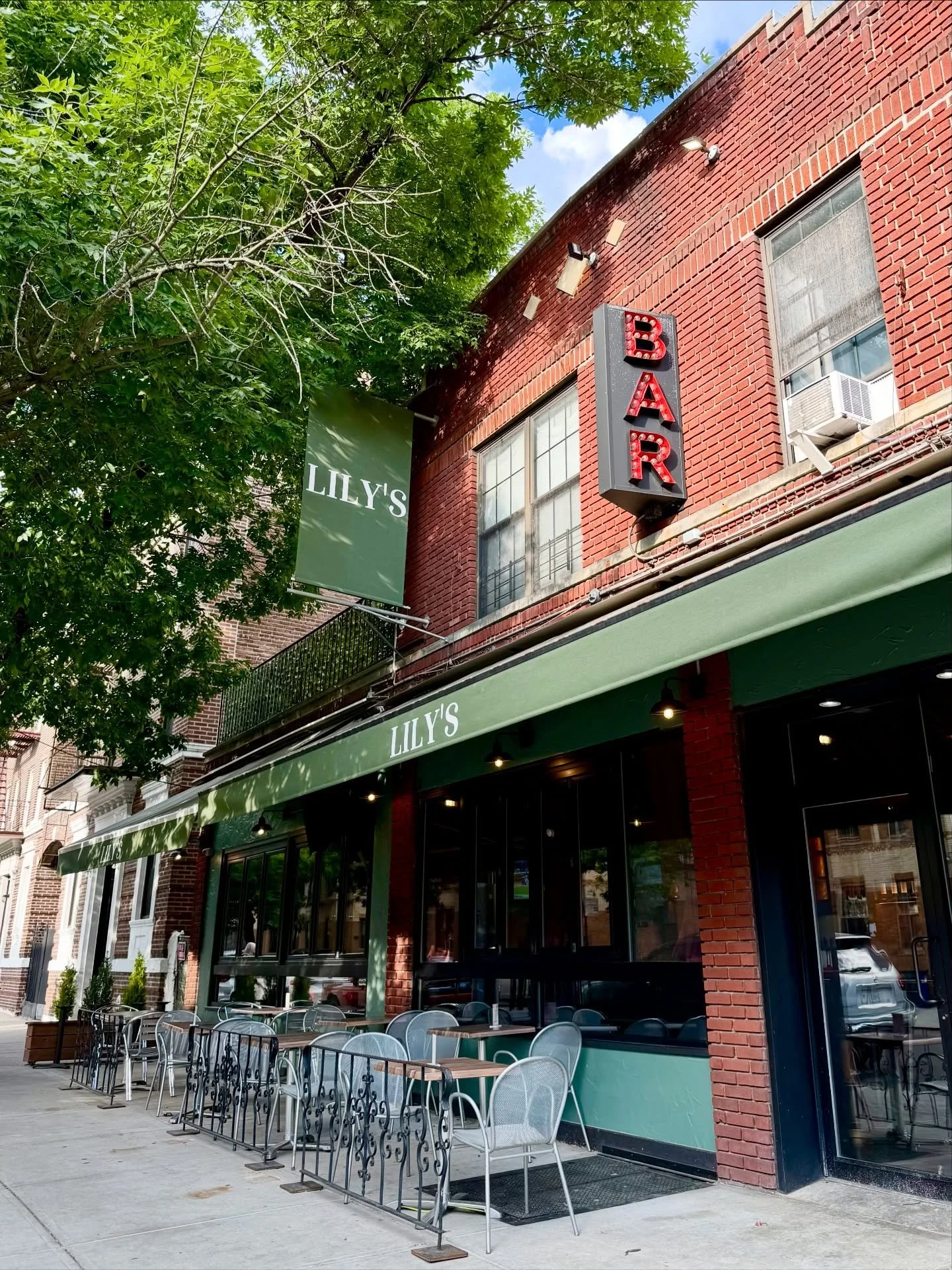 Tomorrow, we&rsquo;ll gather around tables to eat, drink, and be merry. But tonight? Tonight we meet at Lily&rsquo;s for an Open Bar. Let&rsquo;s order that extra-dirty martini we absolutely did not need. Let&rsquo;s chat with the stranger next to us