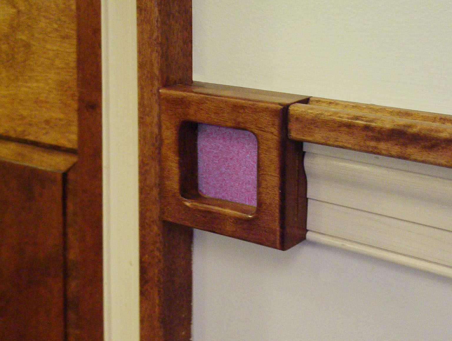 Inserts next to each bedroom door have uniquely different colors and textures so that the most severely impaired students can still identify their room.