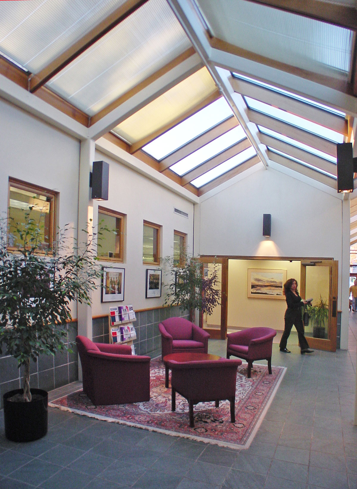 The visually impaired enjoy the same things as everyone else; fresh air, the warmth of the sun on their face, and a glare-free environment. Mechanical shades reduce glare and control the natural light in this lobby.