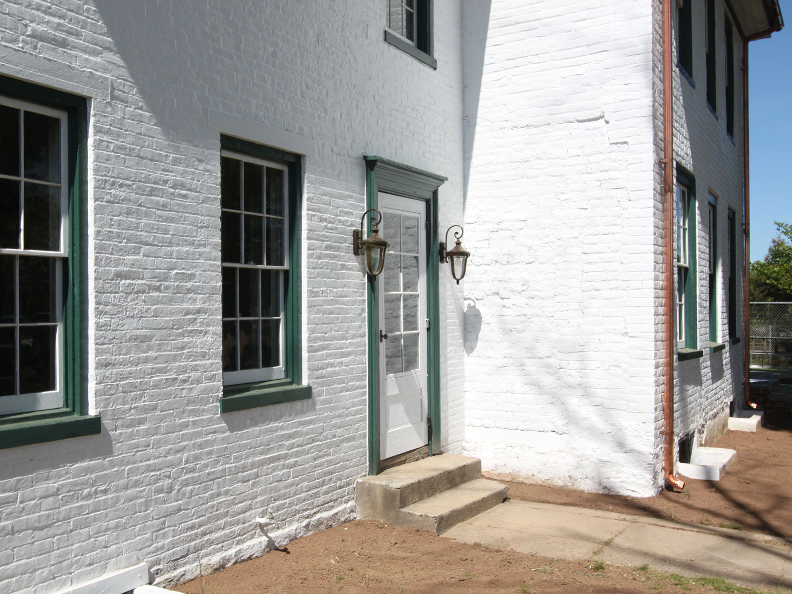 Close-up view of restored entrance where lattice entry was removed