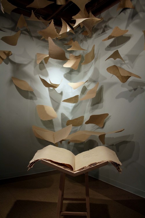 MICHELLE WILSON. El Proceso , 2007. Handmade flax and abaca paper, monofilament, custom book stand, letterpress, and screen print.