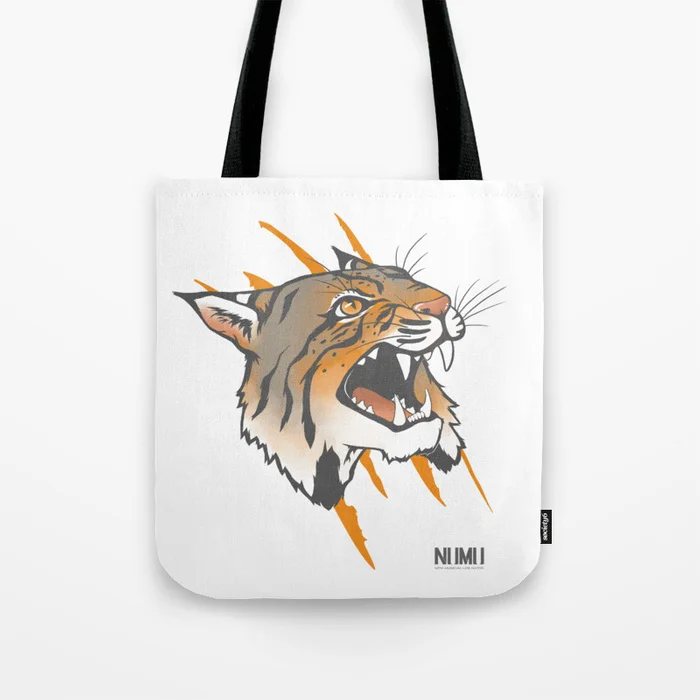 A white tote bag with a wildcat design