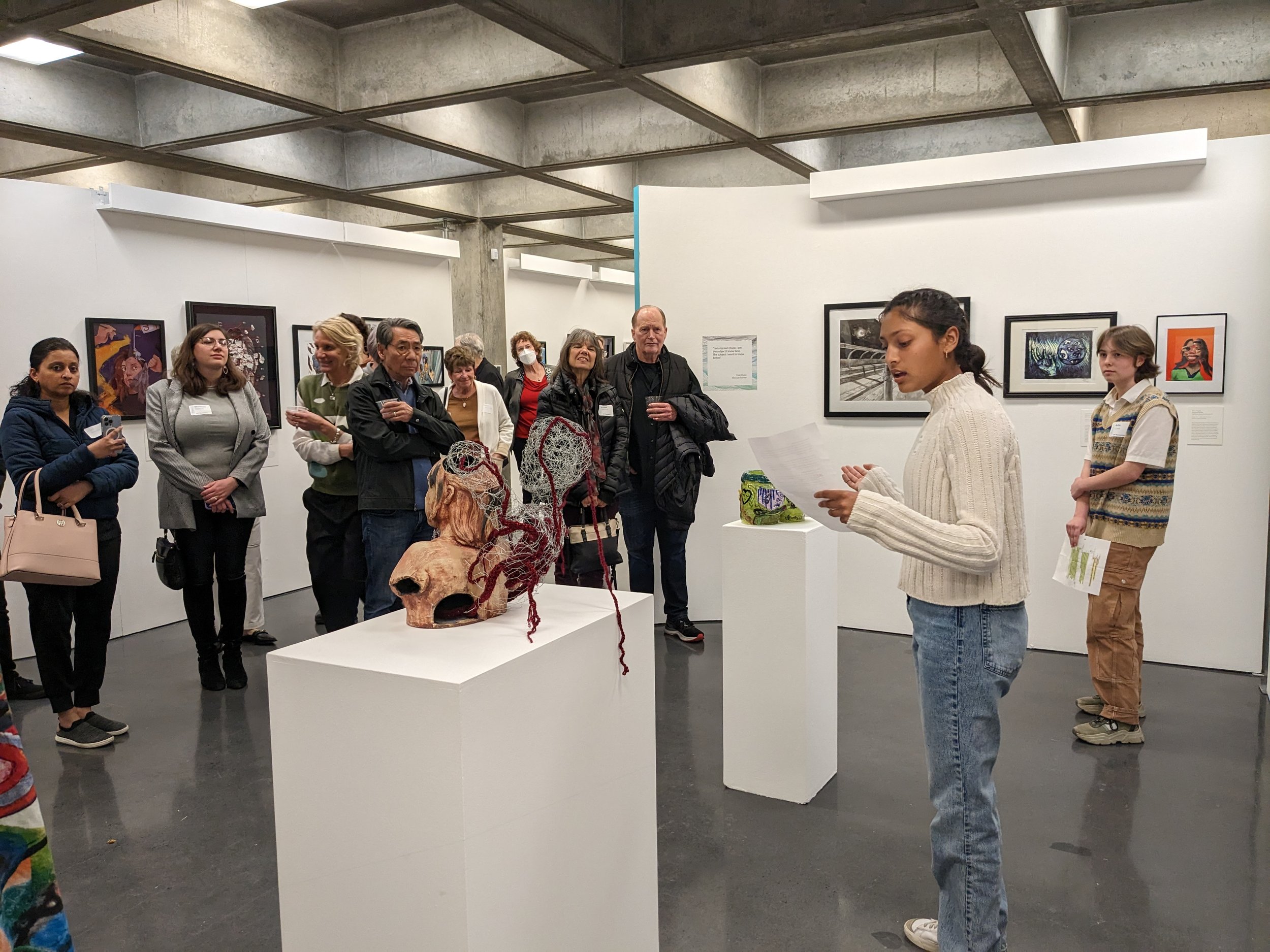 The 2023 ArtNow Teen Council giving a tour of the exhibition
