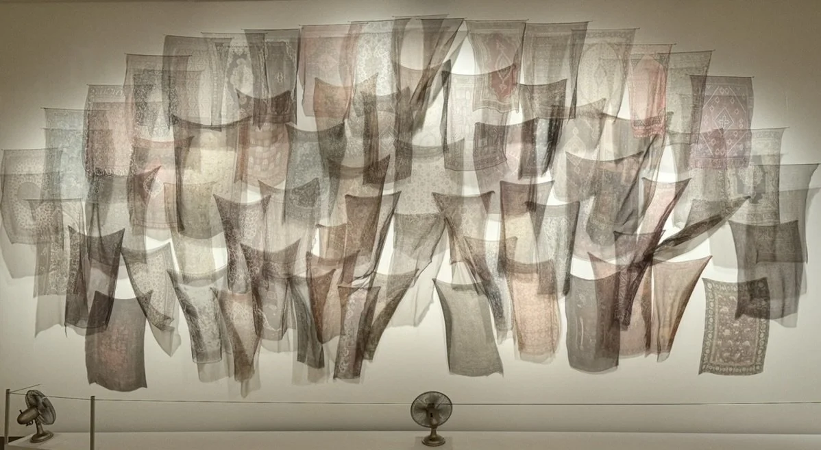 Thinking About Migration (2020), Installation of digital prints on silk gauze with fan and map pins