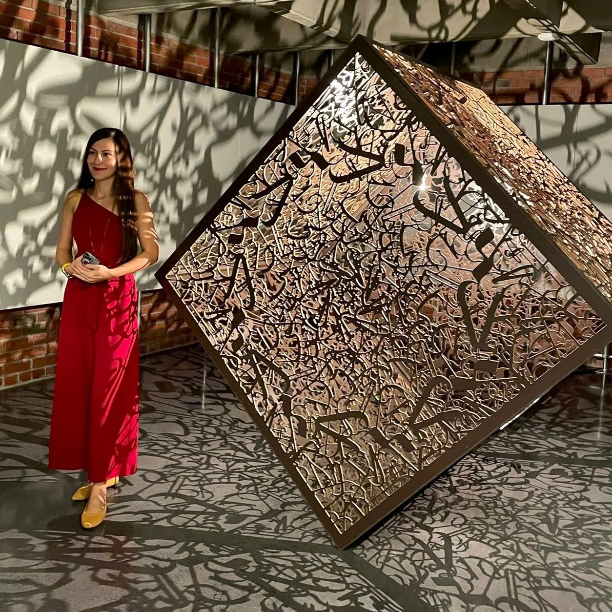  Kiana Honarmand, posing with  On Edge , on view in    (Un)familiar    