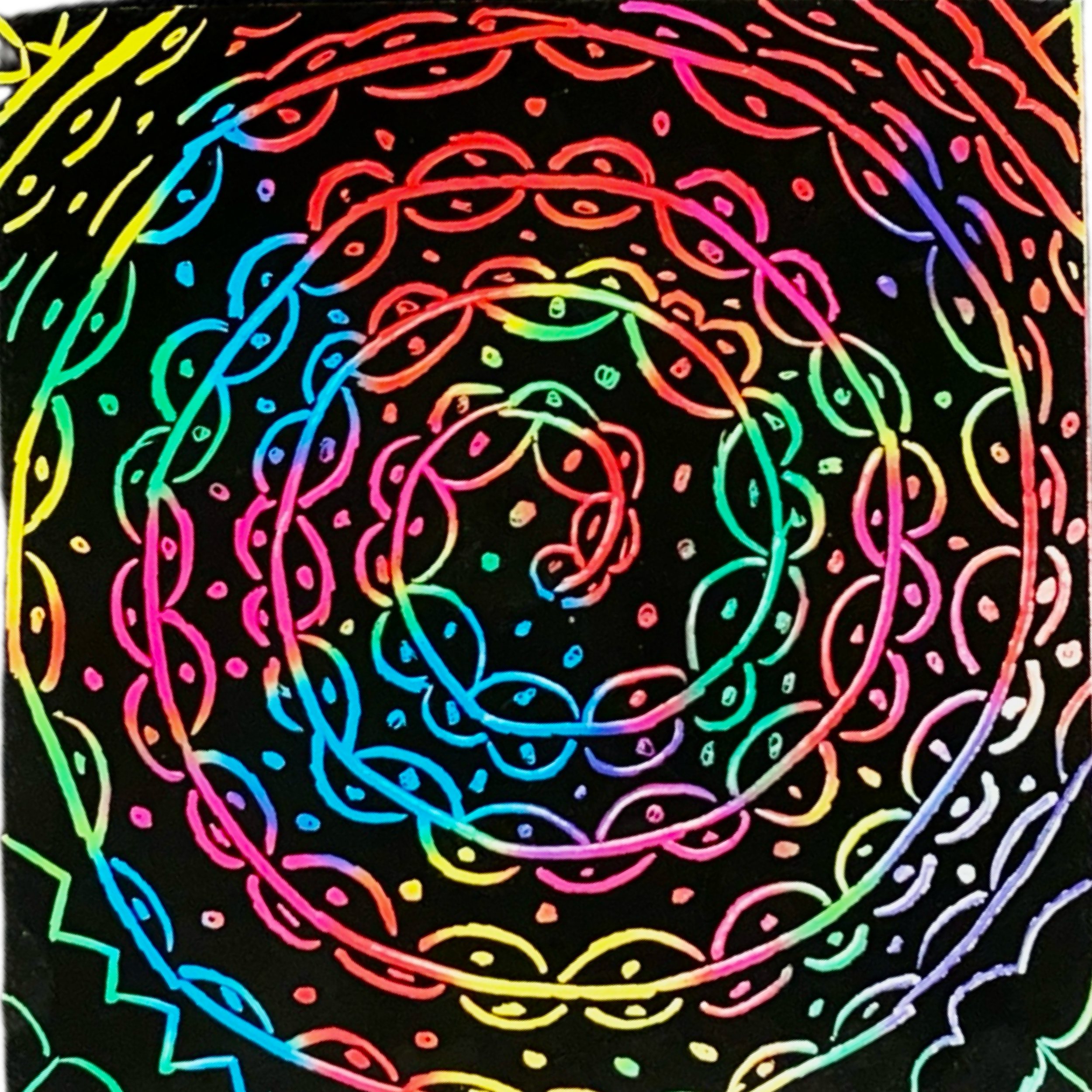 A rainbow image on a black background of a spiraling pattern