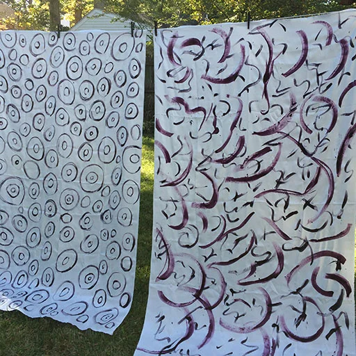 First layer of gestural marks and shapes on two 2-yard lengths of silk charmeuse
