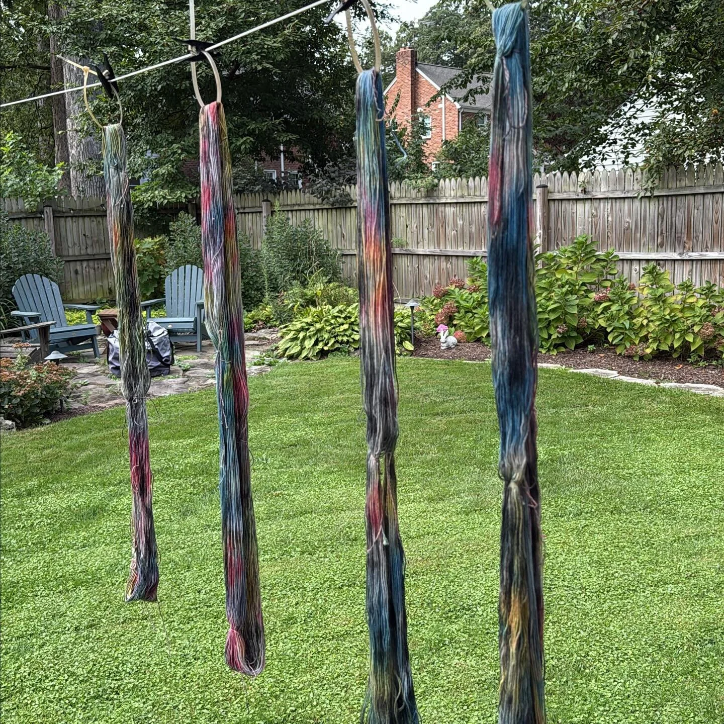 It&rsquo;s finally time to move beyond sampling! I&rsquo;ve figured out the weave pattern and sett for my next project, and I&rsquo;ve built up a MIGHTY stash of hand spun weft. Here&rsquo;s the hand dyed warp drying on the line. Next step is winding