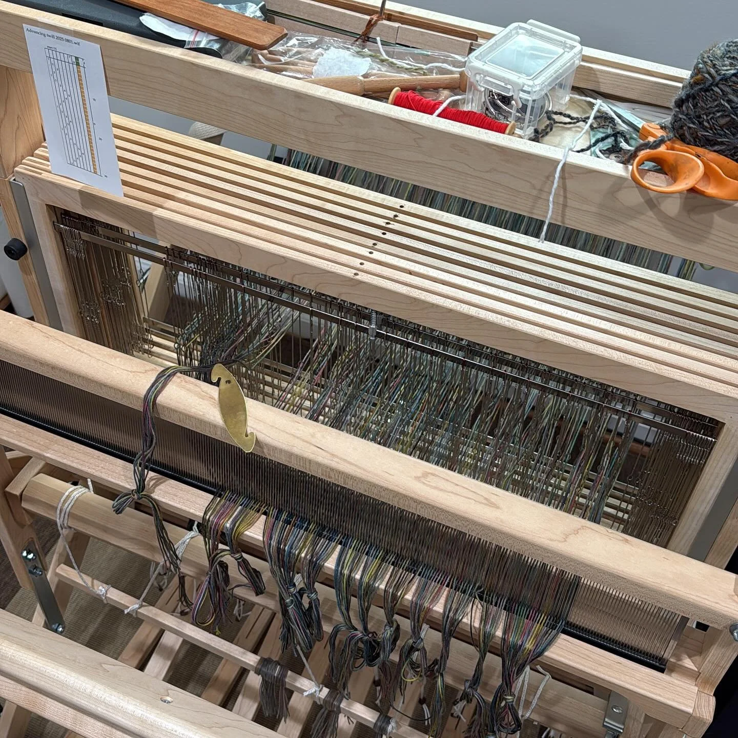 Making great progress on getting the loom dressed with this 4-yard hand dyed warp of 8/4 cotton. #handweaving  @artclothnetwork @hyattsvillefiberartsguild