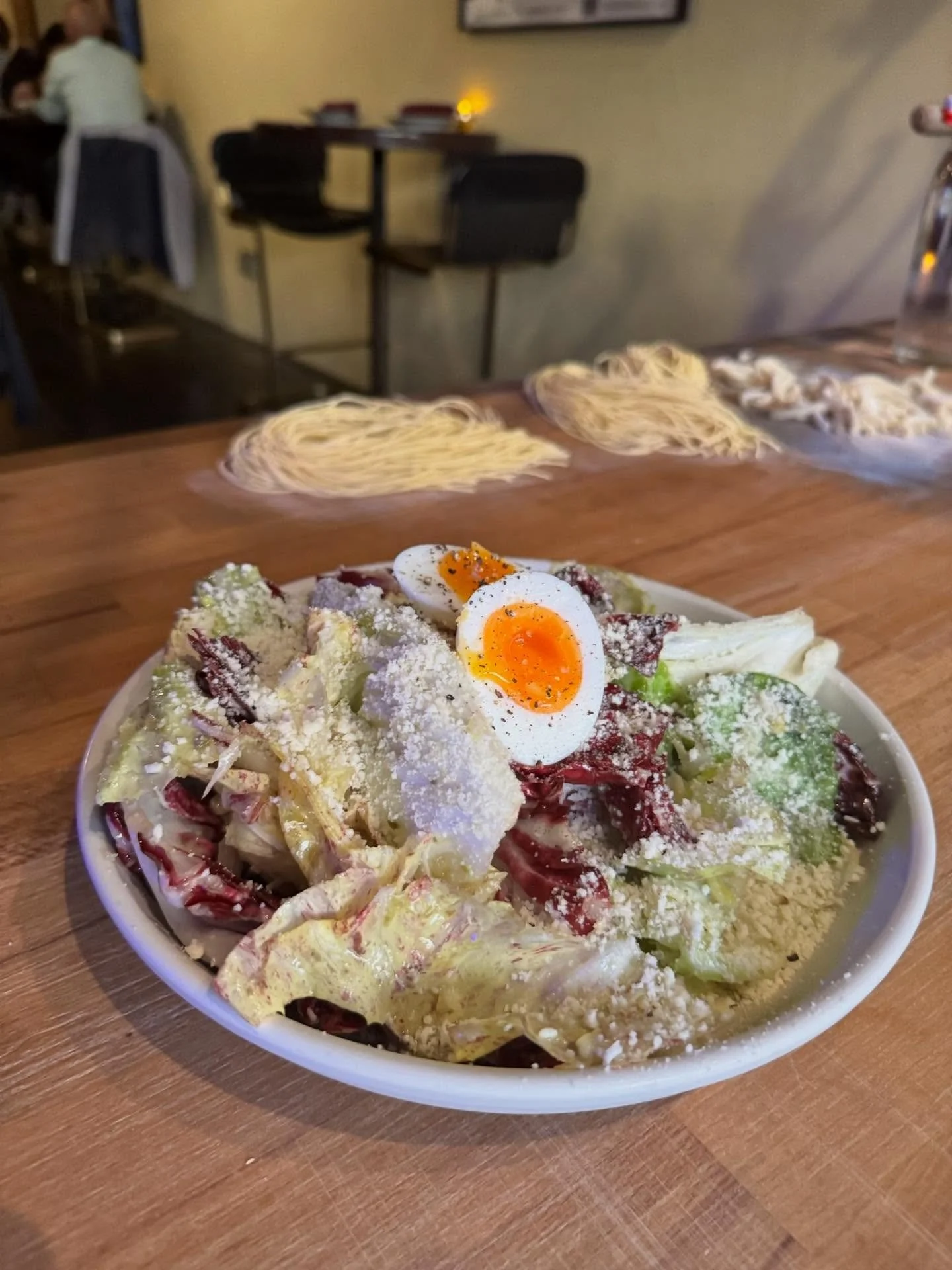 The @hayshakerfarm chicory salad @bar.bacetto is a staple, so although it’s #chicoryweek2025 you can find this on the menu for most of the year. Rotating cast of bitter characters, it’s smothered with a whole lemon and caper vinaigrette,