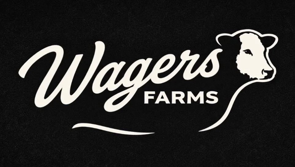 A logo that includes text that says "Wagers Farms" and a cow with a white face