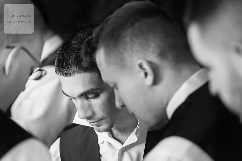 Elias getting some help with his details from the Groomsmen.