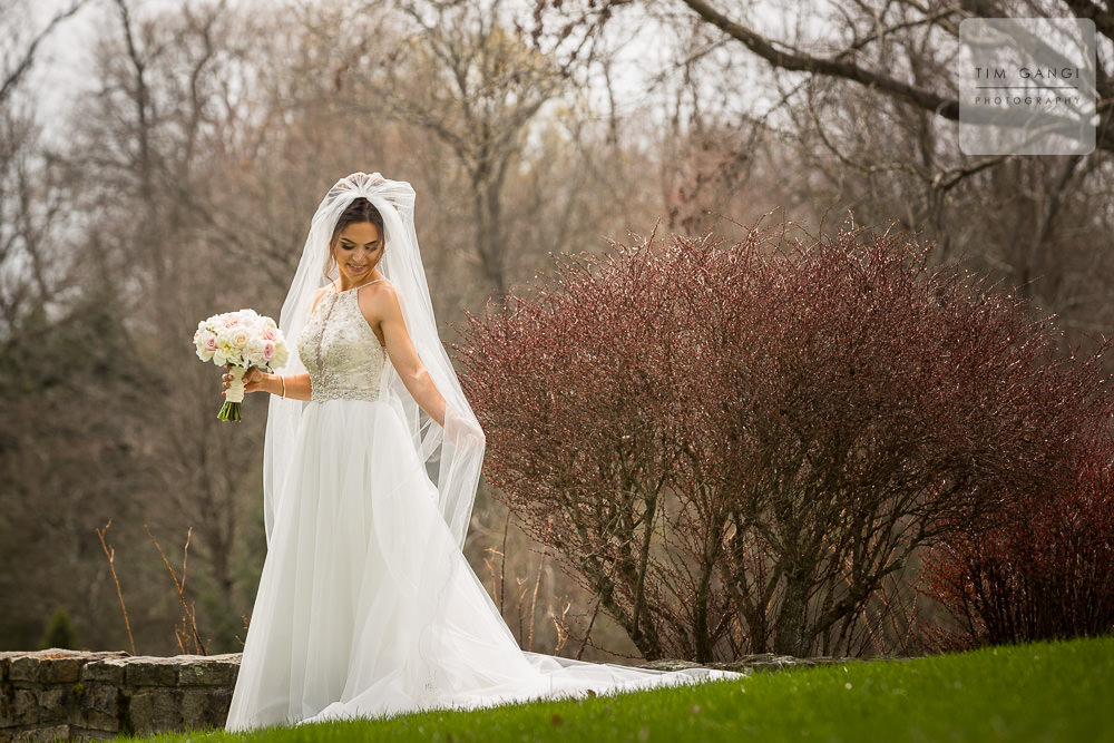 Kailey being playful with her long and beautiful veil.