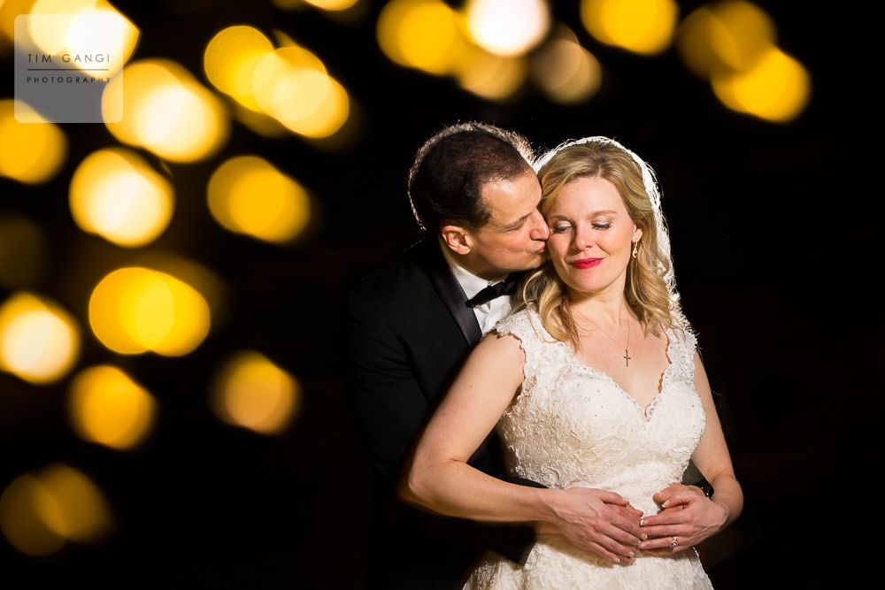 Closing the night with a loving kiss between the newlyweds!