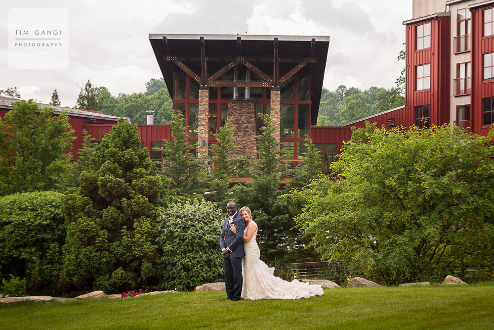  The new Mrs. + Mr. Ogada posing in front of Bear Creek's amazing backdrop. 
