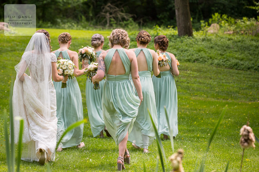 These mint bridesmaids dresses match the greenery of Bittersweet farm perfectly.