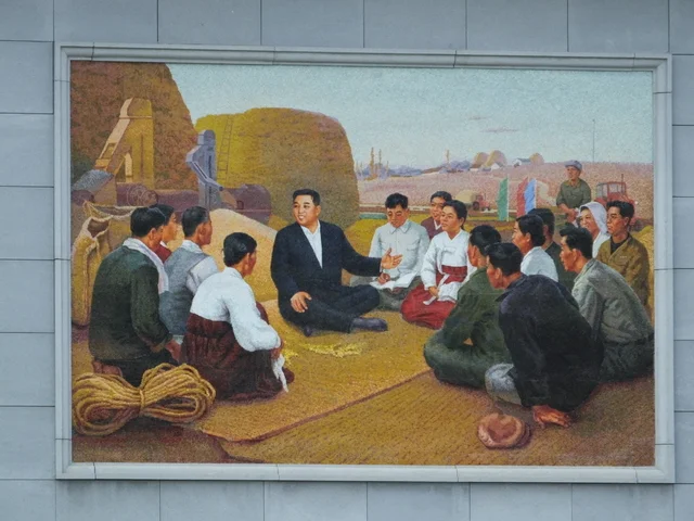 PRESIDENT KIM IL SUNG SITTING with the FARMERS