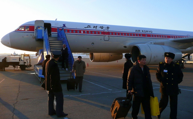 Arrival on Air Koryo at Pyongyang Sunan International Airport on Russian Ilyushin-62 jet.