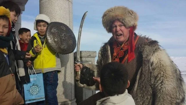 Photo: Don Christian instructs a class in savagery to a young Mongol horde (next generation) at the huge Chenggis Khan museum and monument on the steppes outside Ulaan Bataar. (c) don christian.
