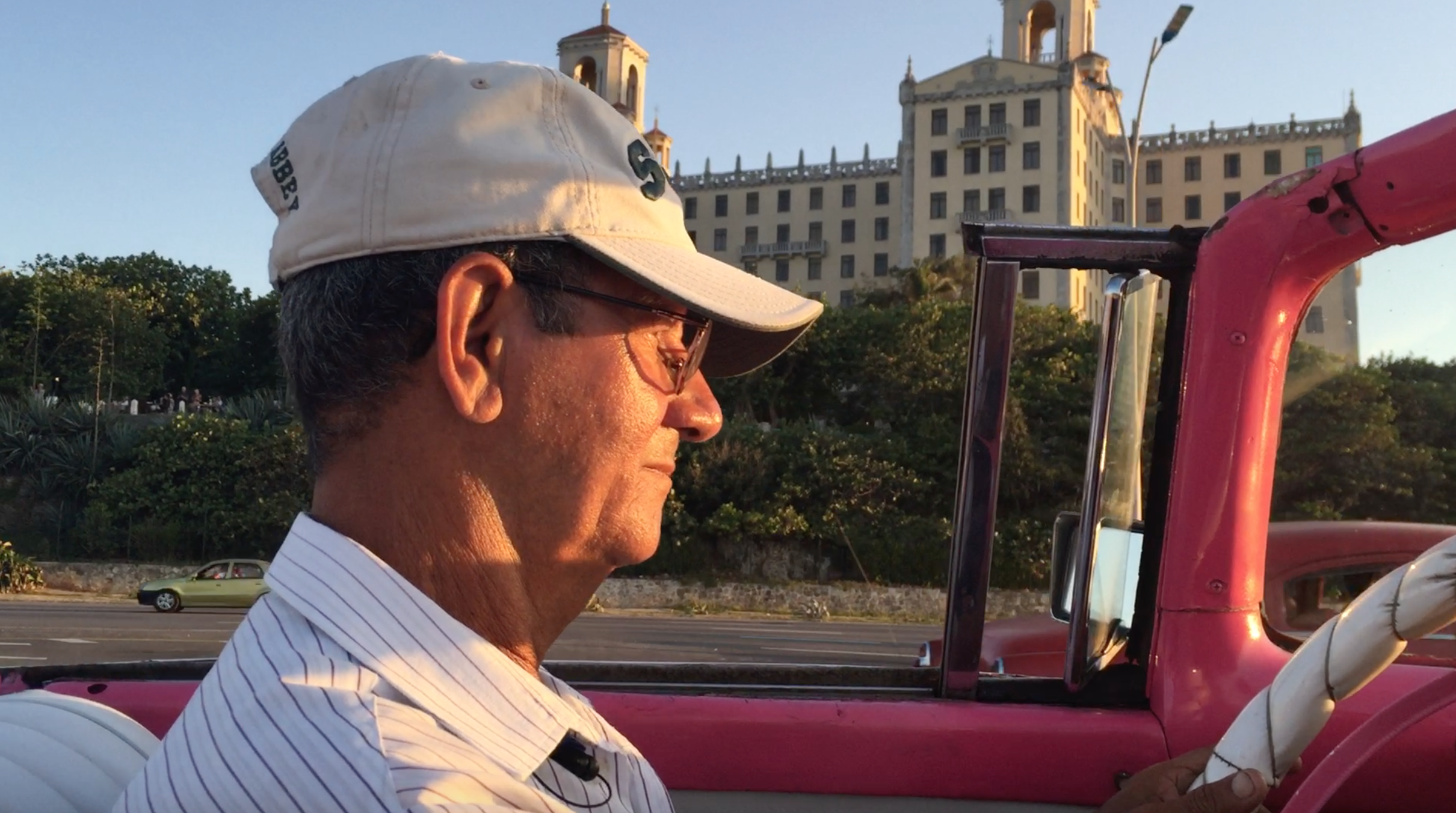 Mi amigo, Gustavo, driving us in the pink ford convertible