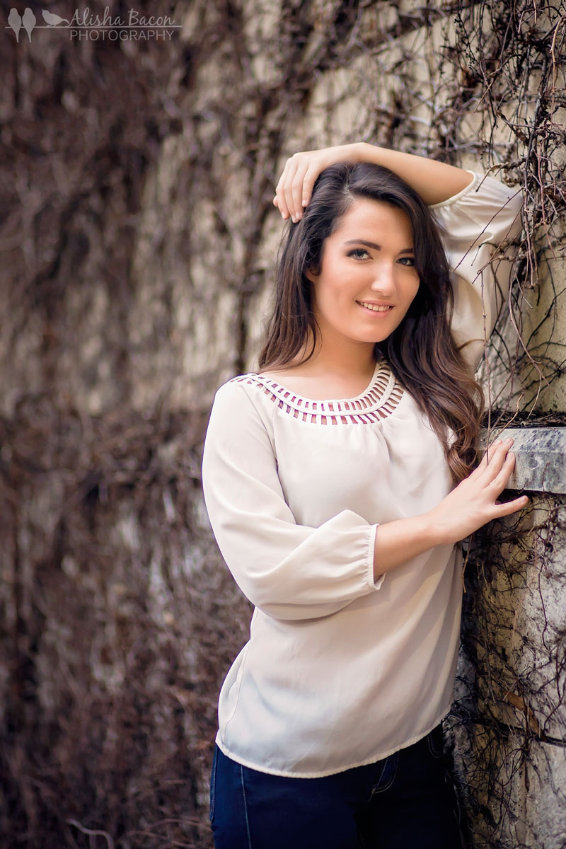 Leaning up against a vine wall, creates a very elegant portrait. 