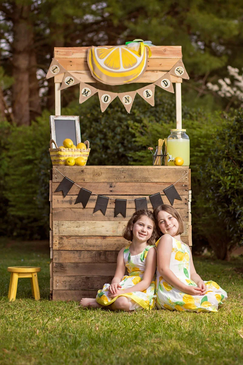 sisters-sitting-smiling-together.jpg