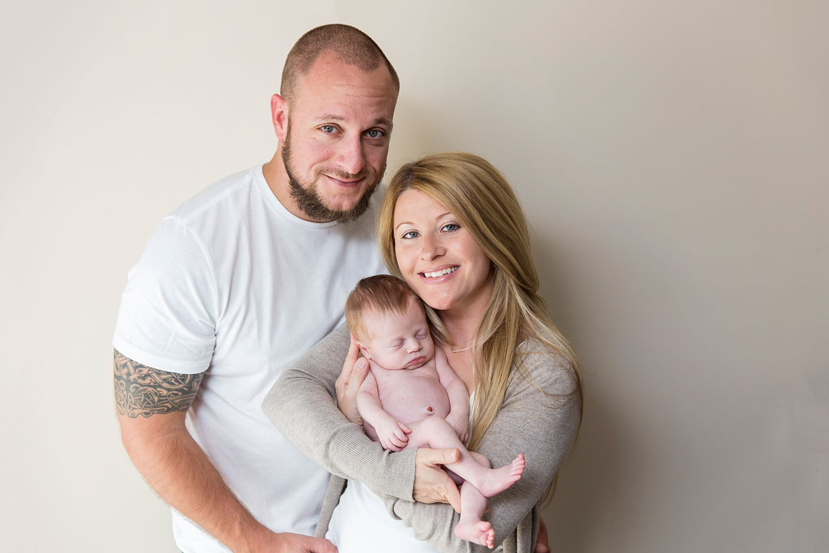 family-of-three-newborn-pose.jpg