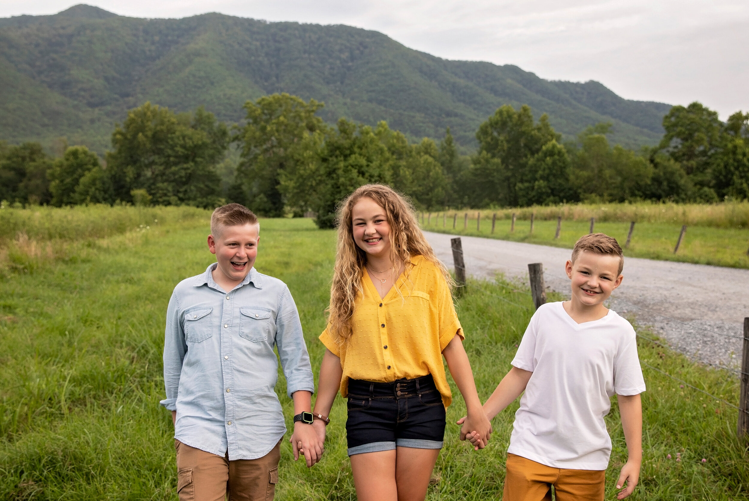 hand-holding-sibling-picture-cades-cove-tn.jpg