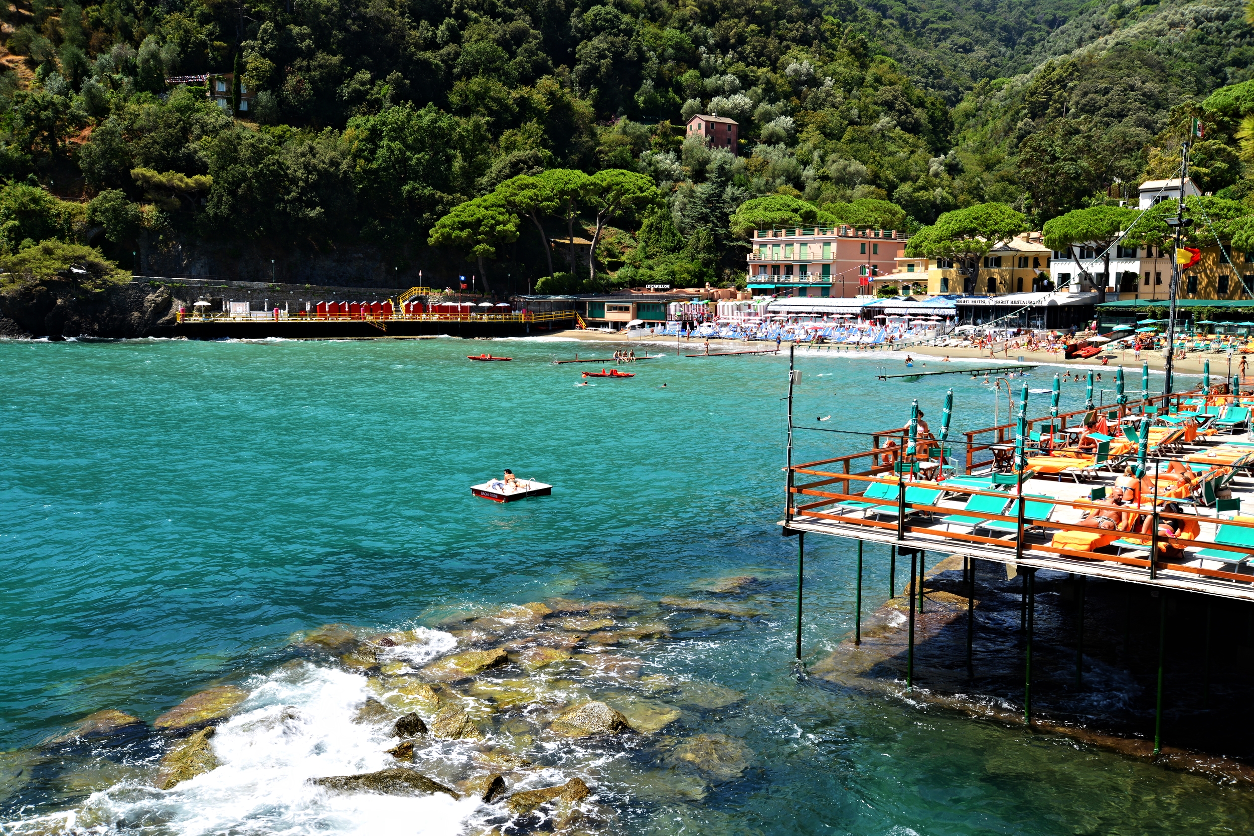 The bright turquoise warm water of the Liguria Coast in Italy is so inviting, you can't resist to jump in!