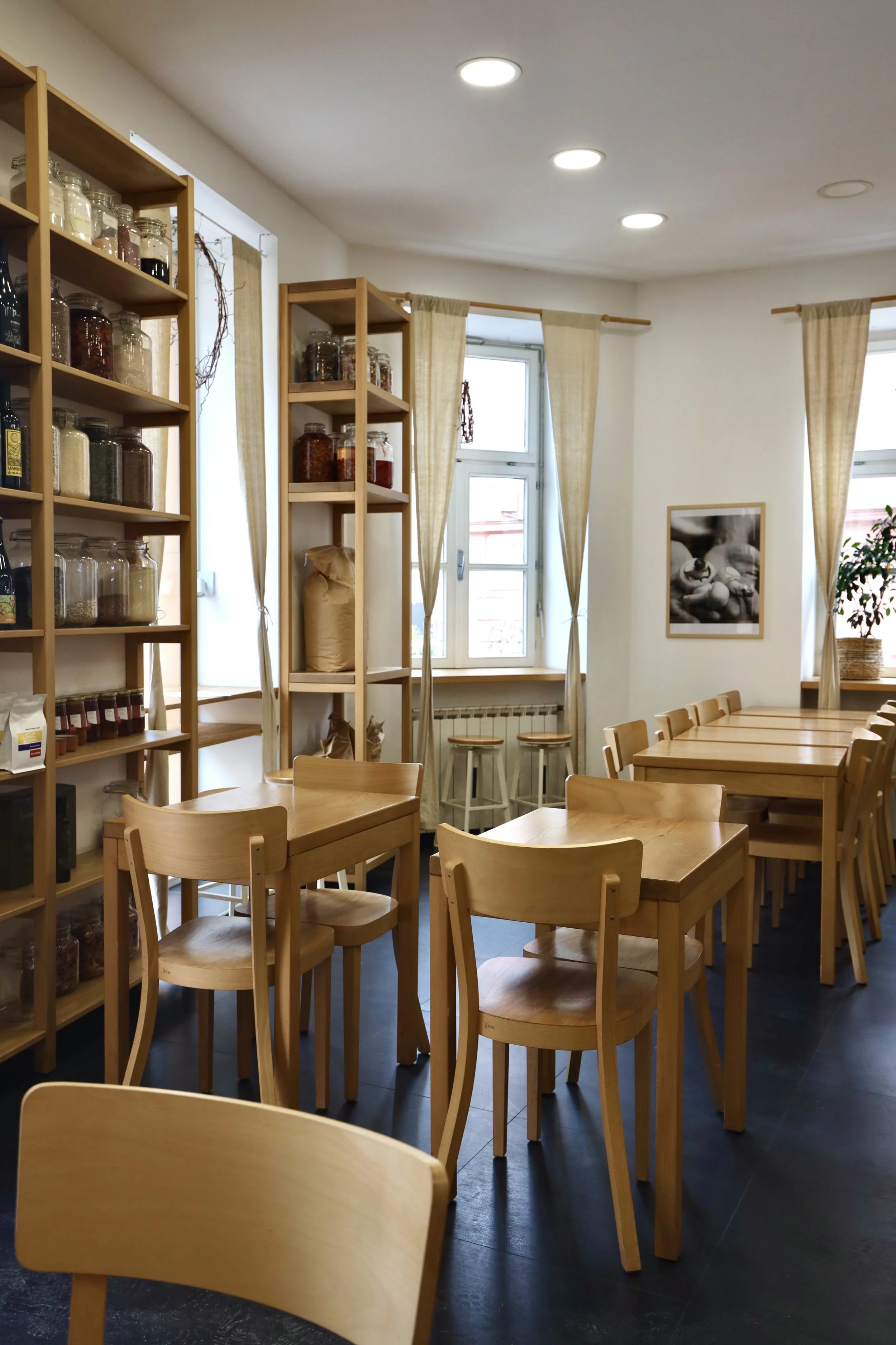 bakery and bistro Salo, natural light, wood, pantry-style shelves, linen