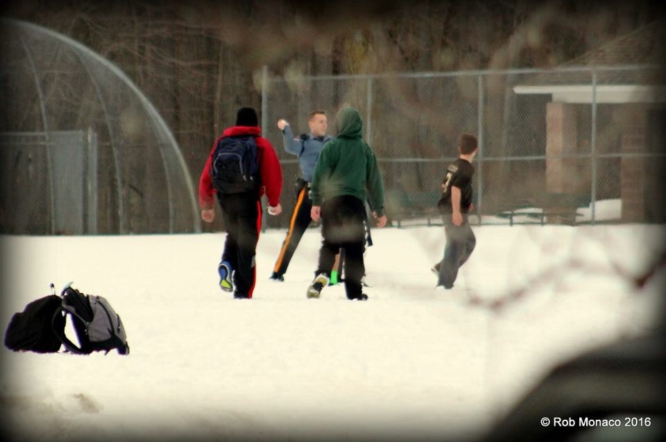 Officer Paulic having a snowball fight