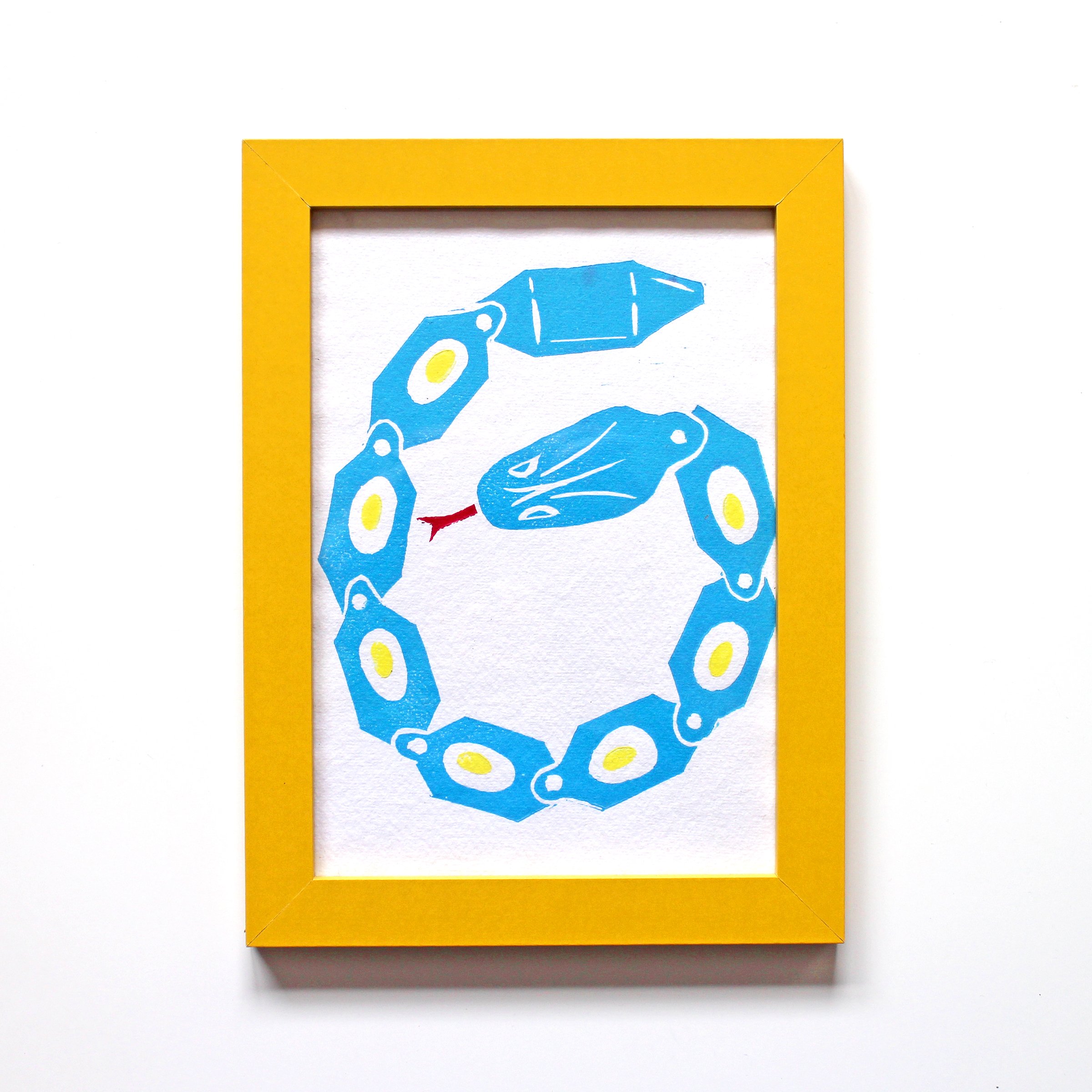 Snake Toy Blue Lino Framed 1.jpg
