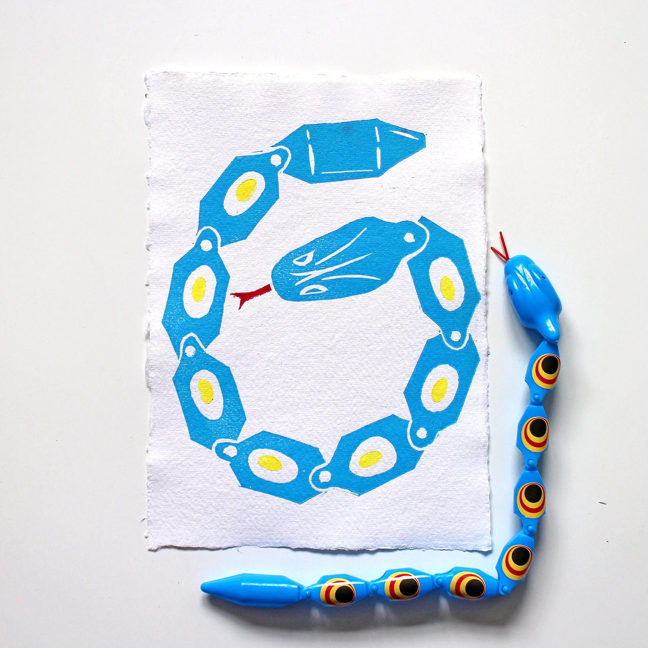 Snake Toy Blue Lino Snakes White square 1.jpg