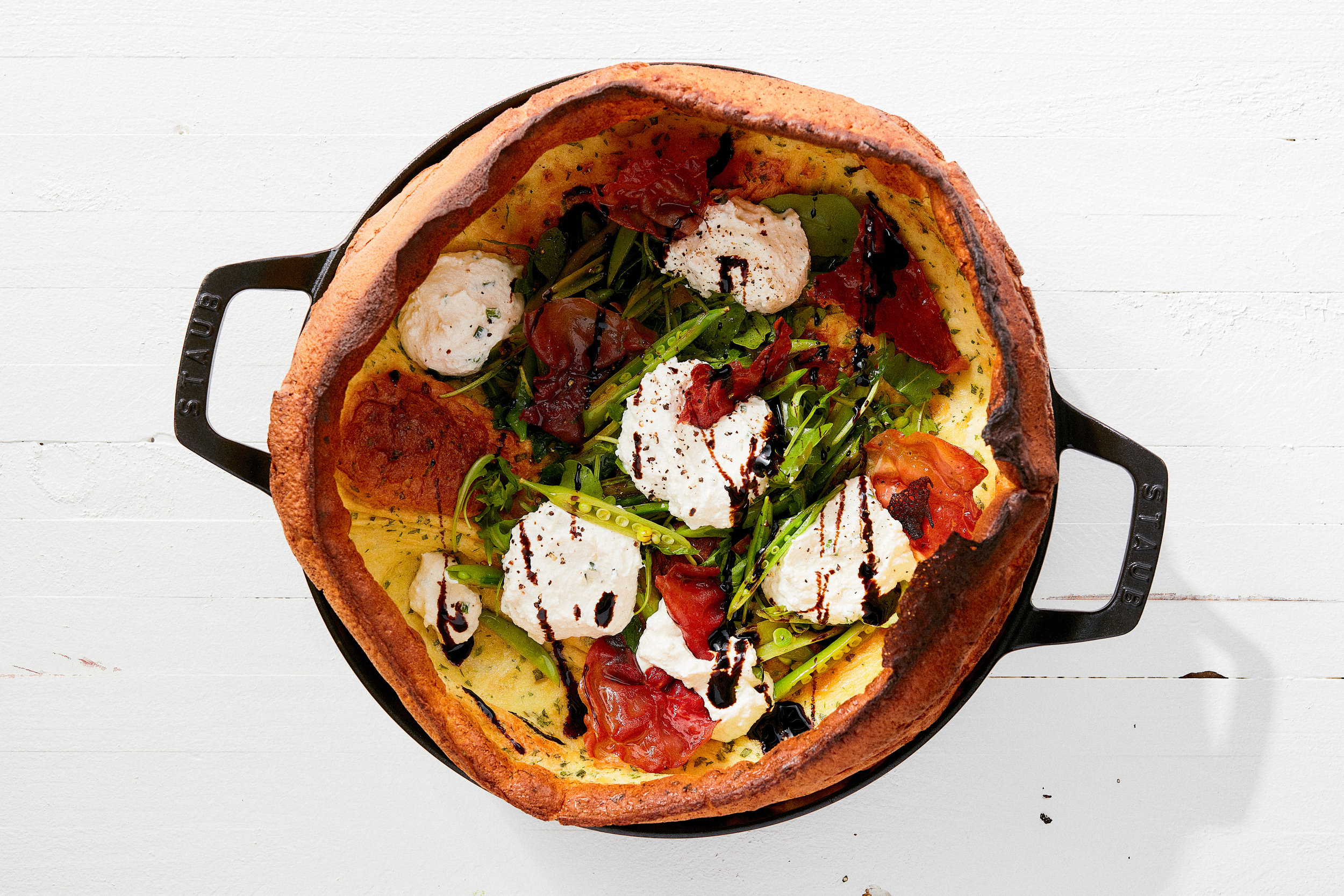 kB6iXExrQdaS4oHzn0oC_Savory_Dutch_Baby_with_Crispy_Prosciutto__Ricotta__and_Snap_Peas-0023__THUMB.jpg