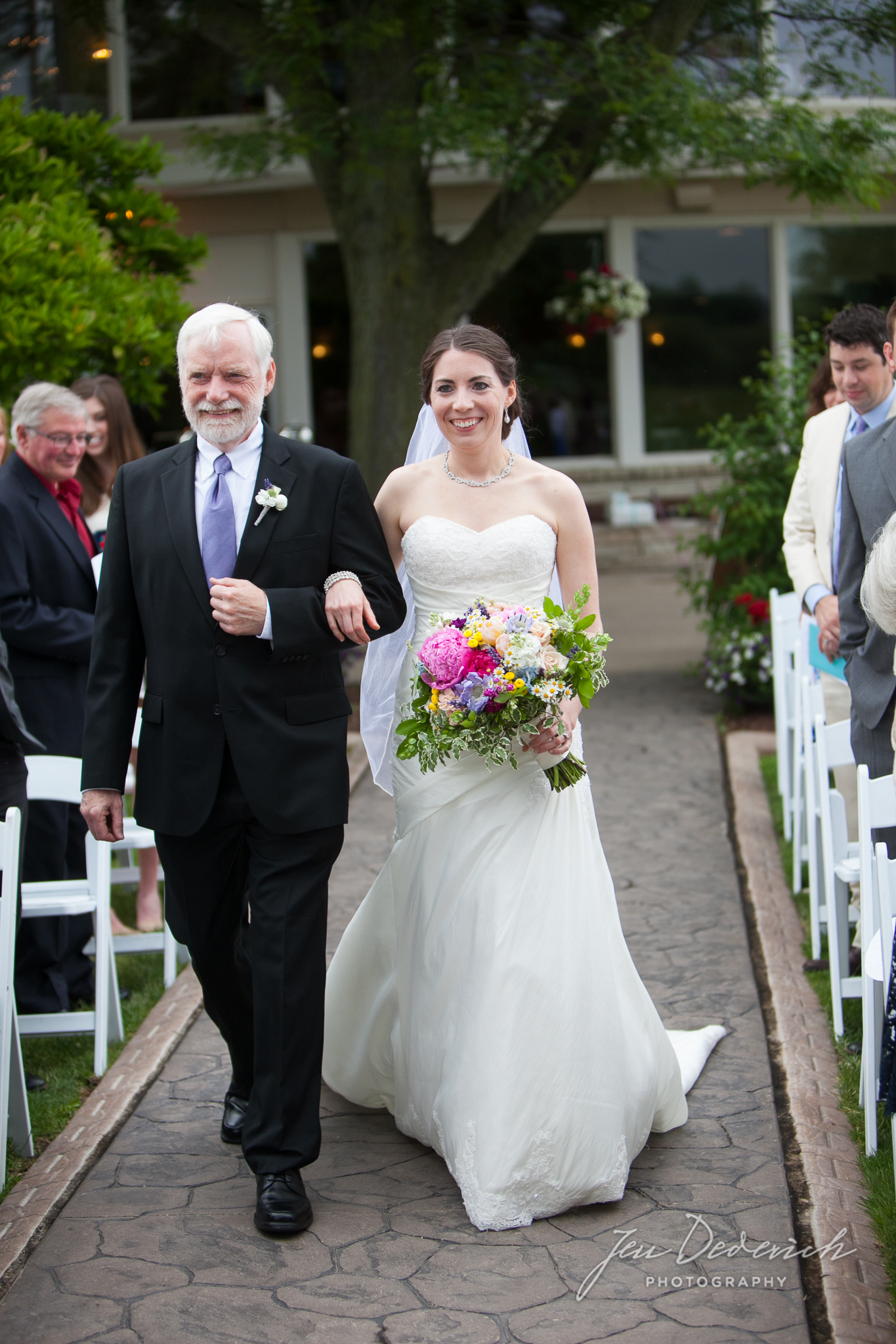 bride aisle with father