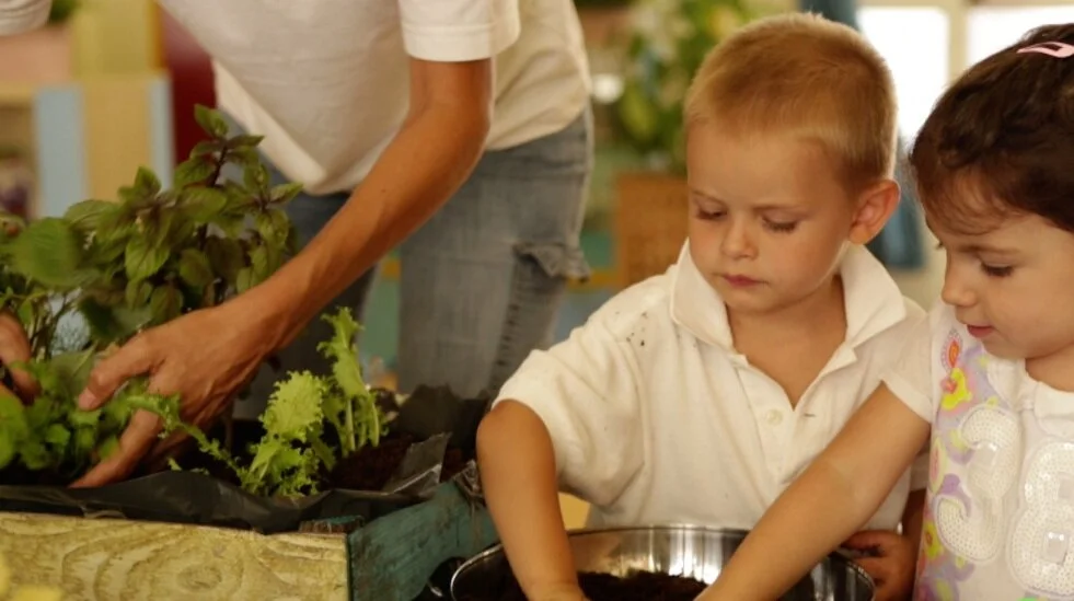 2+kids+working+soil.jpg
