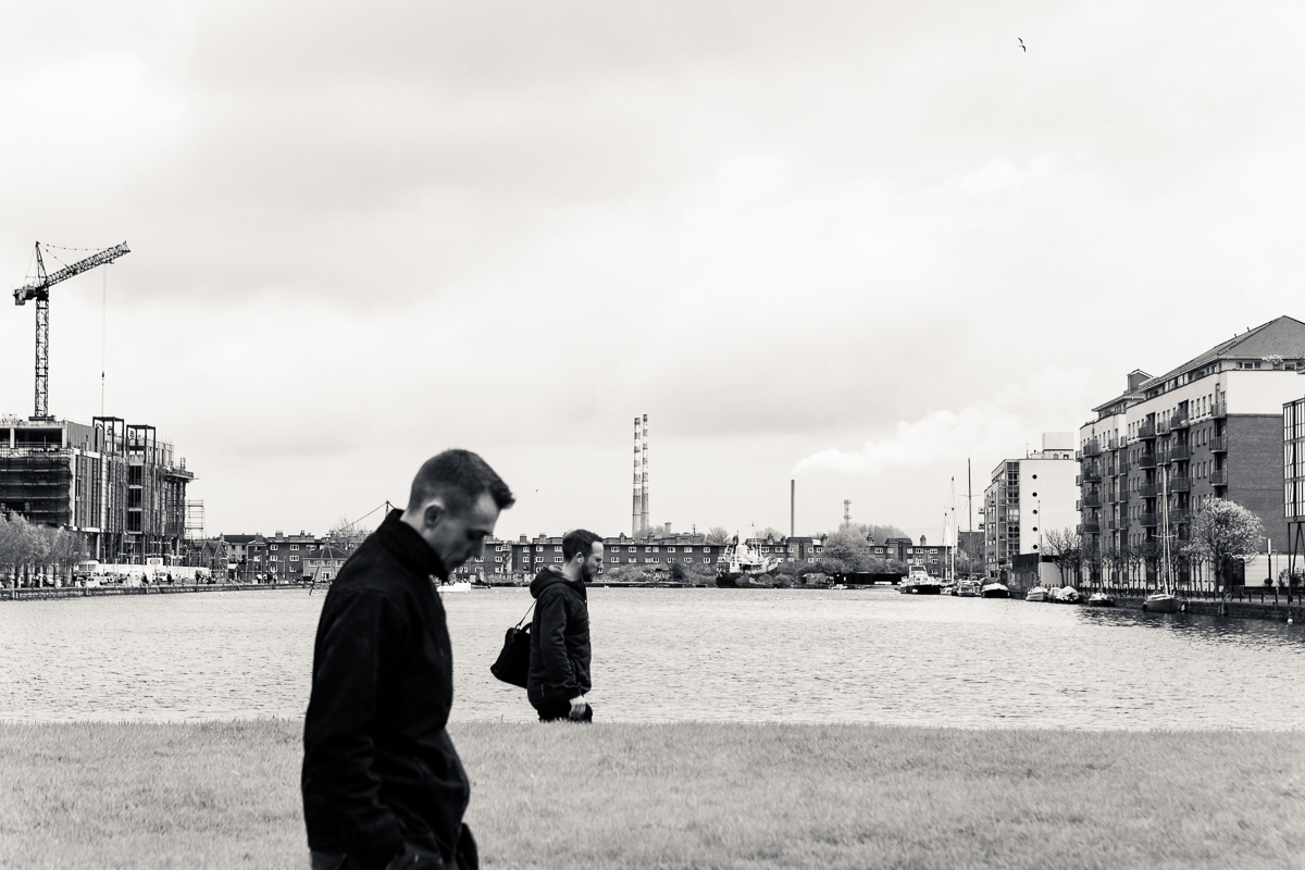 A bird and two men